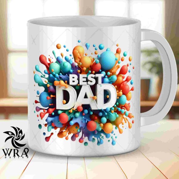 A white mug with colorful splashes and the text "Best Dad" on it sits on a wooden table. The WRA logo is visible in the bottom left corner.