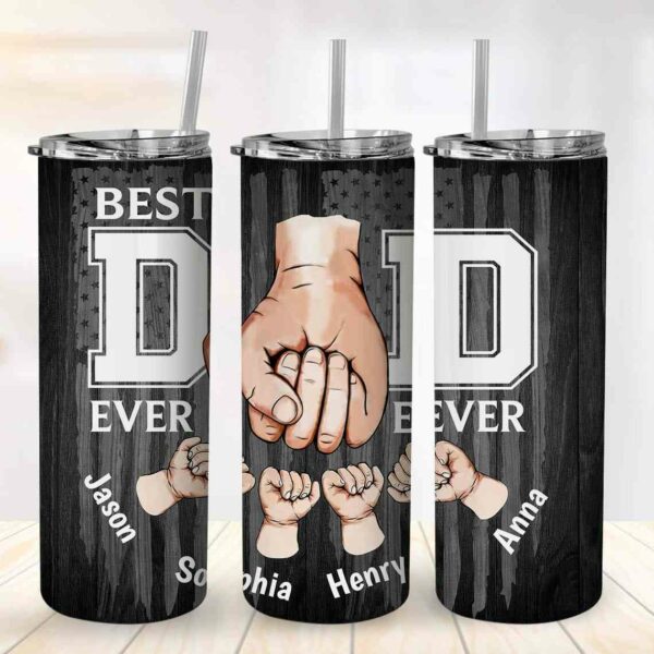Three tall drink tumblers with straws, featuring "Best Dad Ever" text and images of a large hand fist-bumping smaller hands named Jason, Sophia, Henry, and Anna, against a dark wood-like background.