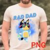 A bearded man is wearing a light-colored T-shirt with a cartoon character and the text "RAD DAD" on the front. The character is a blue dog wearing colorful sunglasses, standing confidently with hands on hips against a background of colorful splatters.