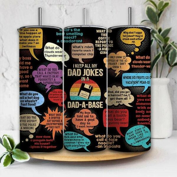 Three cylindrical tumblers feature colorful speech bubbles with joke texts on a black background. The center tumbler reads, "I keep all my dad jokes in a dad-a-base." The other tumblers display various dad jokes in different bright colors.