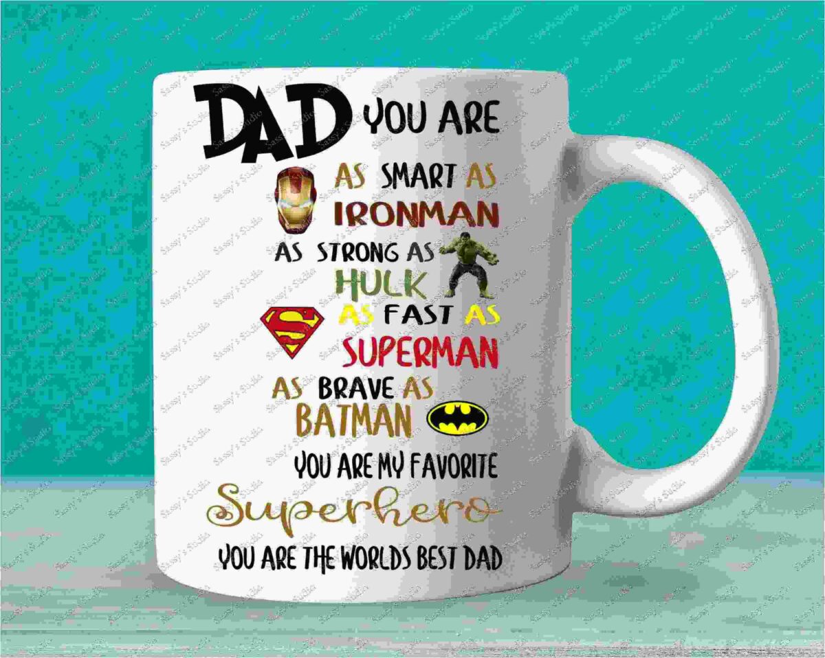 Alt Text: A white mug with a message: "Dad you are as smart as Ironman, as strong as Hulk, as fast as Superman, as brave as Batman. You are my favorite superhero. You are the world's best dad.