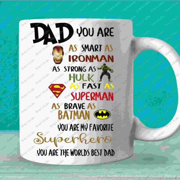 Alt Text: A white mug with a message: "Dad you are as smart as Ironman, as strong as Hulk, as fast as Superman, as brave as Batman. You are my favorite superhero. You are the world's best dad.