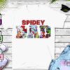 A white t-shirt with the text "SPIDEY DAD" in large, colorful letters, each filled with various Spider-Man characters. The shirt is laid out on a wooden surface alongside sunglasses, a pair of white sneakers, and blue denim jeans. File format icons (SVG, JPEG, PNG) are displayed on the left.