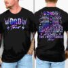 Man wearing a black t-shirt with "Dad Tour" text and graphics on the front. The back features a detailed, colorful list of empowering words and phrases related to fatherhood and the words "The Fatherhood Tour.