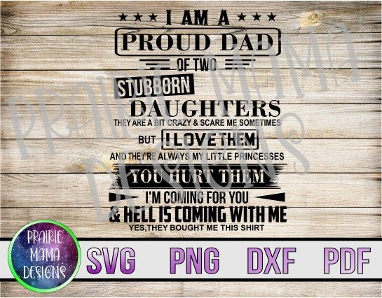 A decorative wooden sign reads, "I am a proud dad of two stubborn daughters. They are a bit crazy & scare me sometimes, but I love them and they’re always my little princesses. You hurt them, I’m coming for you & hell is coming with me. Yes, they bought me this shirt.