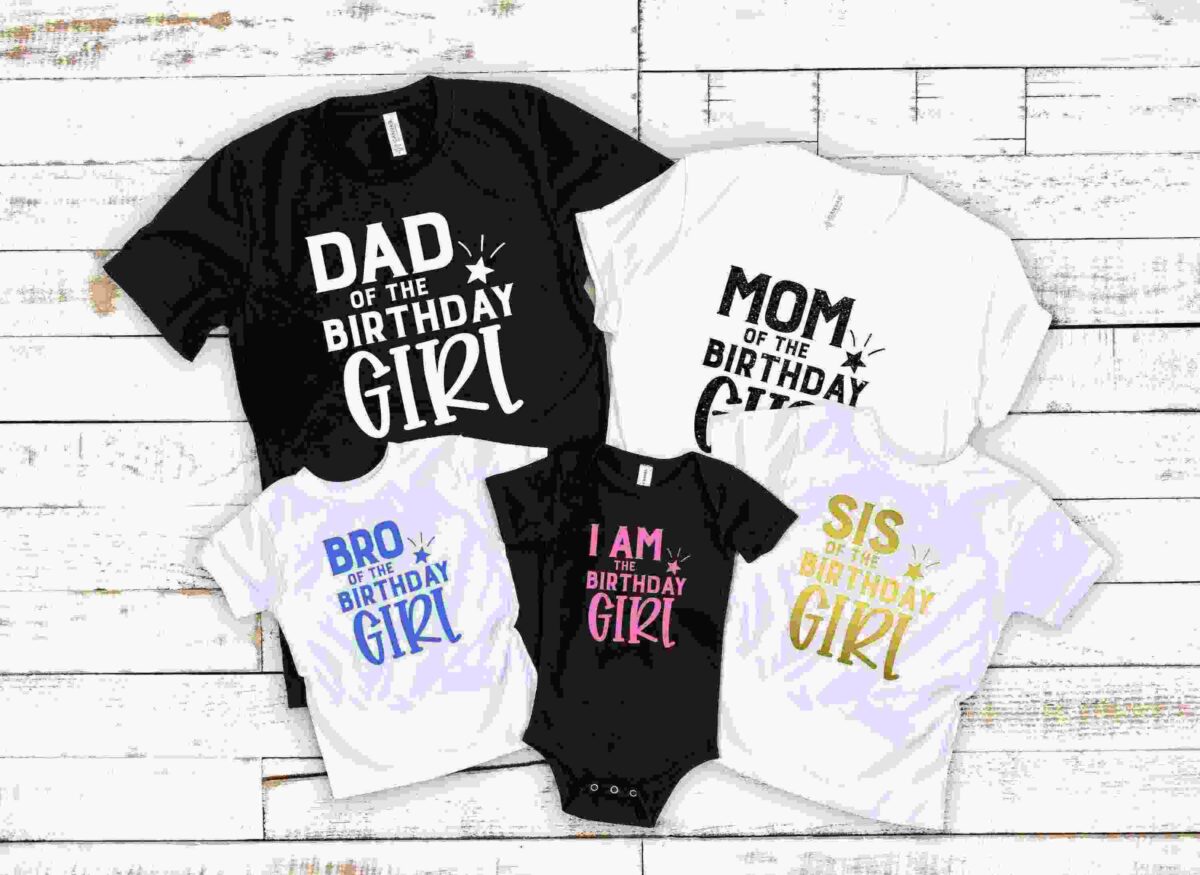 Five t-shirts with birthday-themed texts: "DAD OF THE BIRTHDAY GIRL", "MOM OF THE BIRTHDAY GIRL", "BRO OF THE BIRTHDAY GIRL", "SIS OF THE BIRTHDAY GIRL", and "I AM THE BIRTHDAY GIRL" on a wood background.