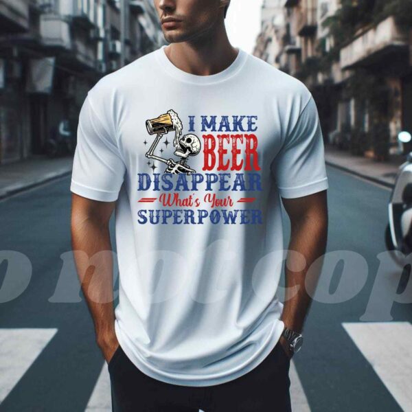 A man stands on a city street wearing a white t-shirt that reads, "I MAKE BEER DISAPPEAR. What’s Your SUPERPOWER," with a cartoon image of a skeleton holding a beer mug.