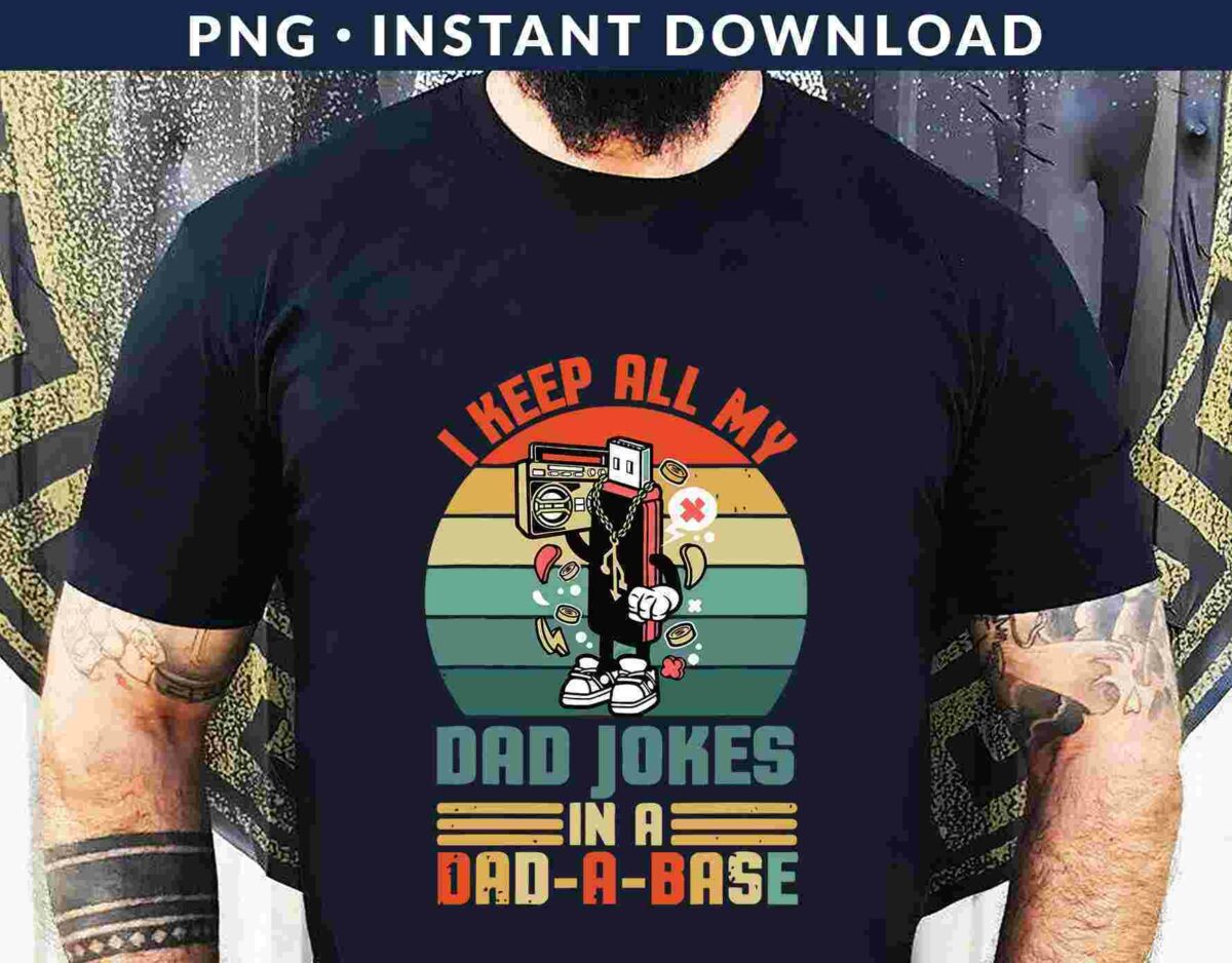 Person wearing a black T-shirt with a cartoon cassette tape character and the text: "I keep all my dad jokes in a dad-a-base.