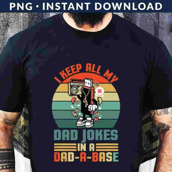 Person wearing a black T-shirt with a cartoon cassette tape character and the text: "I keep all my dad jokes in a dad-a-base.