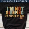 A black t-shirt with the text "I'M NOT SLEEPING, I'm resting my eyes -DAD" in bold, multicolored letters.