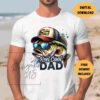 Alt Text: A man on a beach wears a white T-shirt featuring a fish with sunglasses and a cap, and the text "Reel Cool Dad". Text bubbles say "Digital Download" and "Free Designs Included".