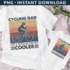 Two white shirts with a cycling dad design. One is an adult T-shirt and the other is a baby onesie, both featuring a cyclist and the text "Cycling Dad Like a Regular Dad But Cooler".