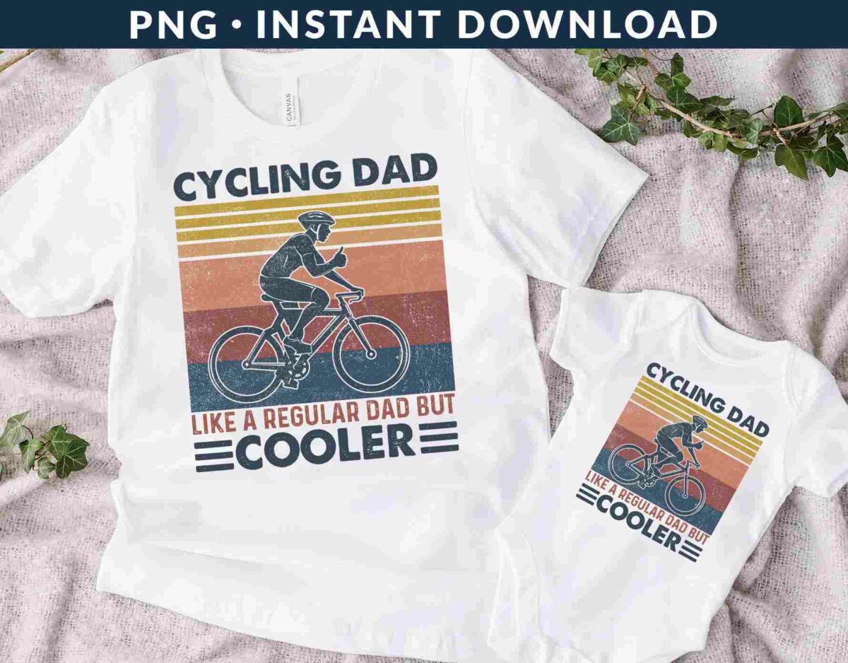 Two white shirts with a cycling dad design. One is an adult T-shirt and the other is a baby onesie, both featuring a cyclist and the text "Cycling Dad Like a Regular Dad But Cooler".