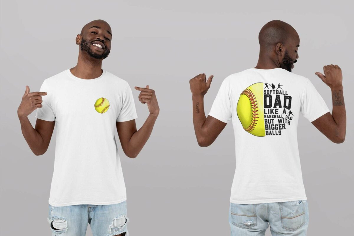 A man wearing a white T-shirt is shown from the front and back. The front of the shirt features a yellow softball graphic. The back of the shirt displays the text, "Softball dad. Like a baseball dad but with bigger balls," accompanied by a softball graphic.