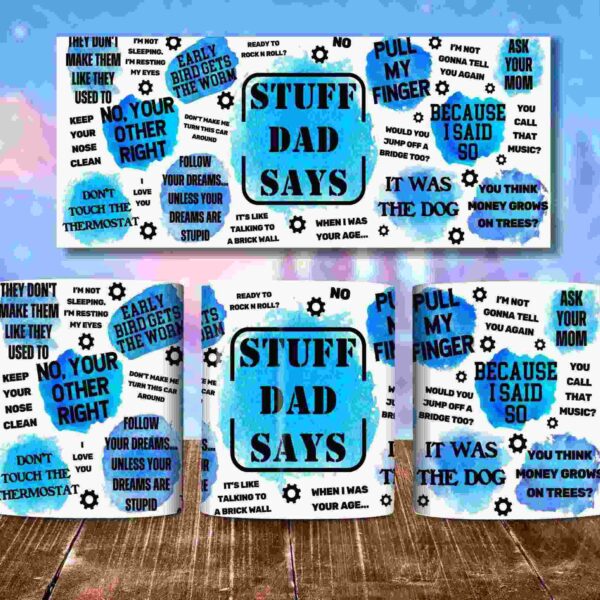 Three mugs and a wall print are decorated with various humorous dad quotes, such as "Stuff Dad Says," "Because I said so," and "Money doesn't grow on trees," against a wooden background.