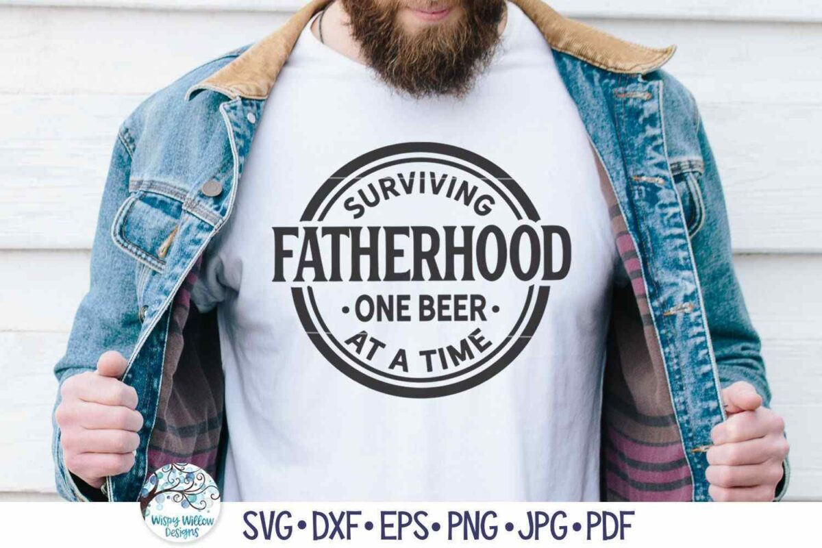 A bearded man is wearing a white T-shirt with the text "Surviving Fatherhood One Beer At A Time" printed on it. He has a denim jacket partially open to reveal the shirt. The bottom includes icons and text indicating different file formats (SVG, DXF, EPS, PNG, JPG, PDF).