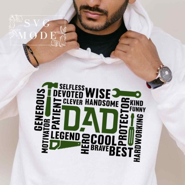 A person wearing a white hoodie with a word cloud design centered around the word "DAD" featuring adjectives like wise, cool, hardworking, and protector.